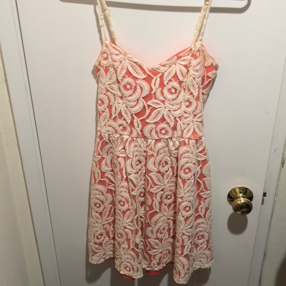 Light pink mini dress with white lace detail
